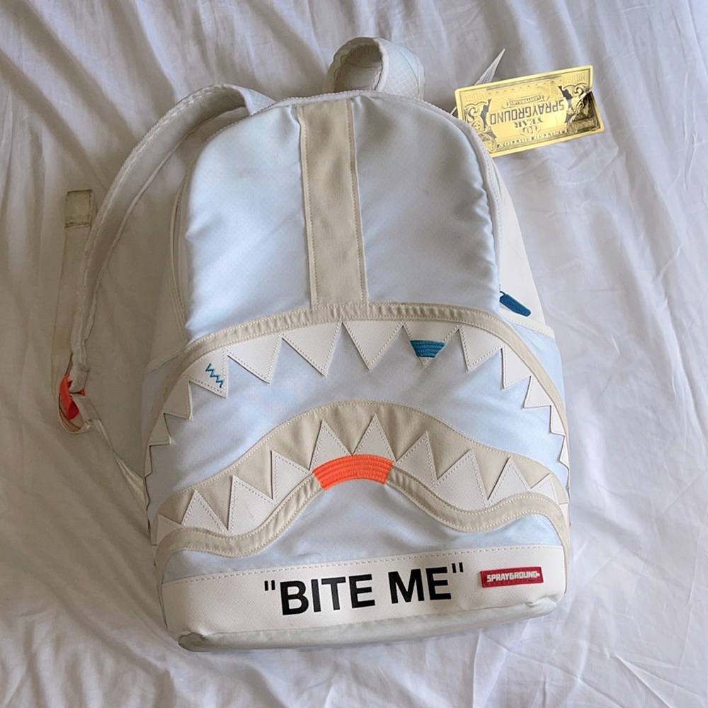 SPRAYGROUNDS OFF WHITE BACK PACK "BITE ME"